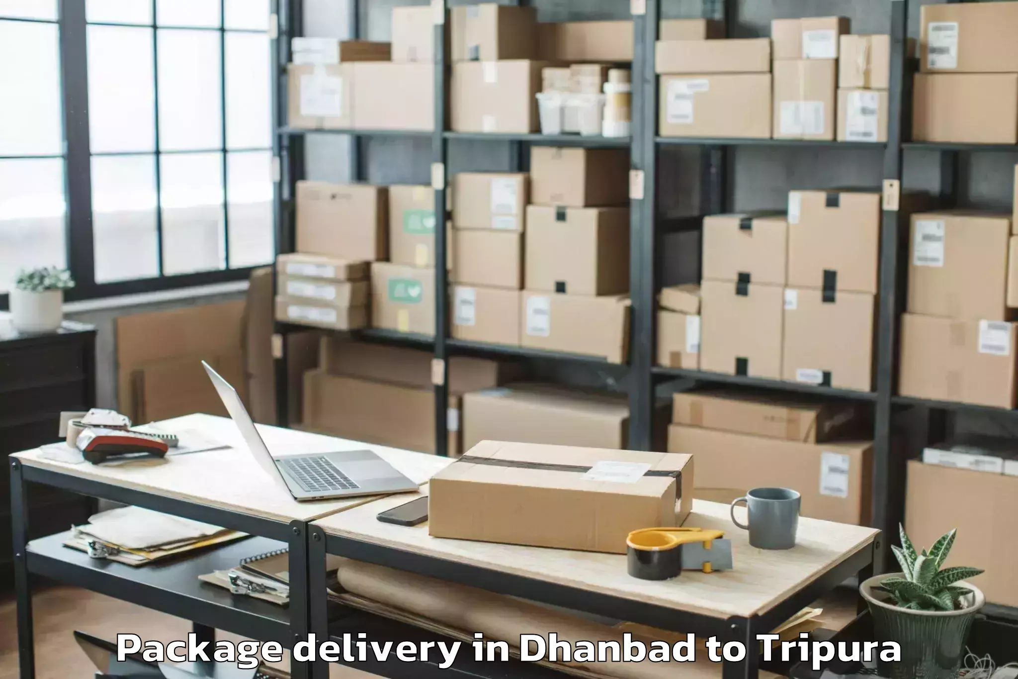 Get Dhanbad to Kamalpur Airport Ixq Package Delivery